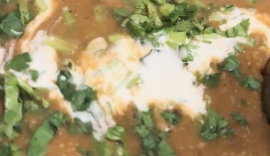 Dal Makhani, a beloved North Indian dish, combines the richness of black lentils and kidney beans in a creamy, spiced gravy.