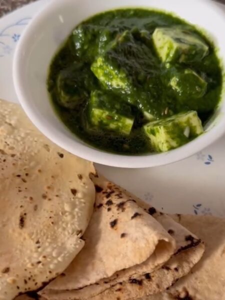 Palak Paneer, a classic North Indian dish, combines creamy spinach and soft paneer for a delicious, nutritious meal.